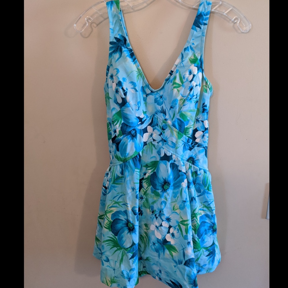 Skirted one piece bait hung suit